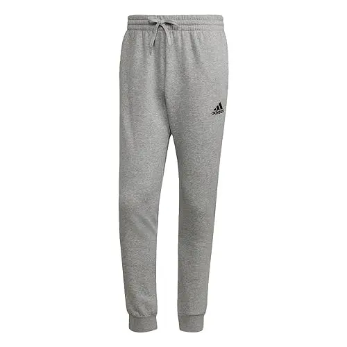 Pantalones Adidas Essentials Fleece Tapered para hombre, Gris Medio/Negro, con comodidad y estilo